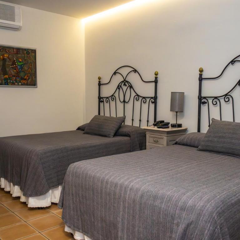 Hotel Boutique Naura Centro - Habitación Doble Estándar con 2 camas dobles - 7