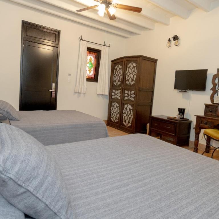 Hotel Boutique Naura Centro - Habitación Doble Estándar con 2 camas dobles - 13