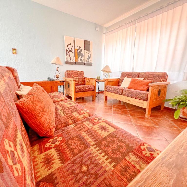 Colorful family condo with terrace and free parking - Three-Bedroom Apartment - 10