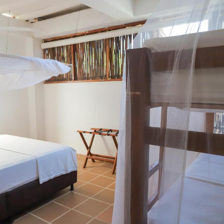 Hostal Casa en la Ciénaga Rincon del Mar - Habitación Cuádruple con vistas al lago - 6