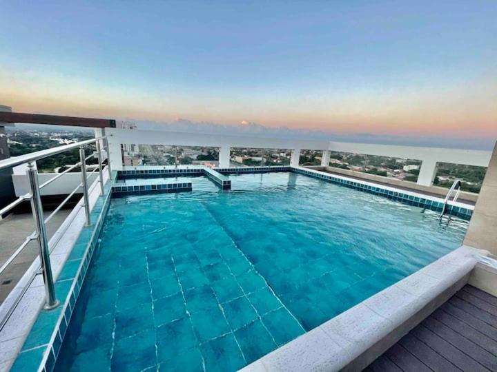 Departamentos de 2D cerca del Aeropuerto WIFI PISCINA SAUNA VAPOR Y SECO - Apartamento de 2 dormitorios - 2