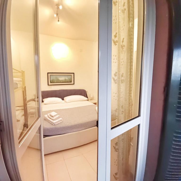 Bilocale Casa Manu Garden - Appartamento con 1 Camera da Letto e Balcone - 5