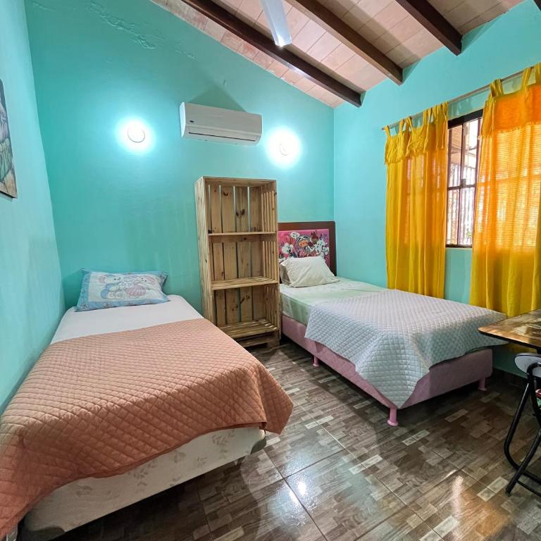 La Casita de Aregua - Three-Bedroom House - 13