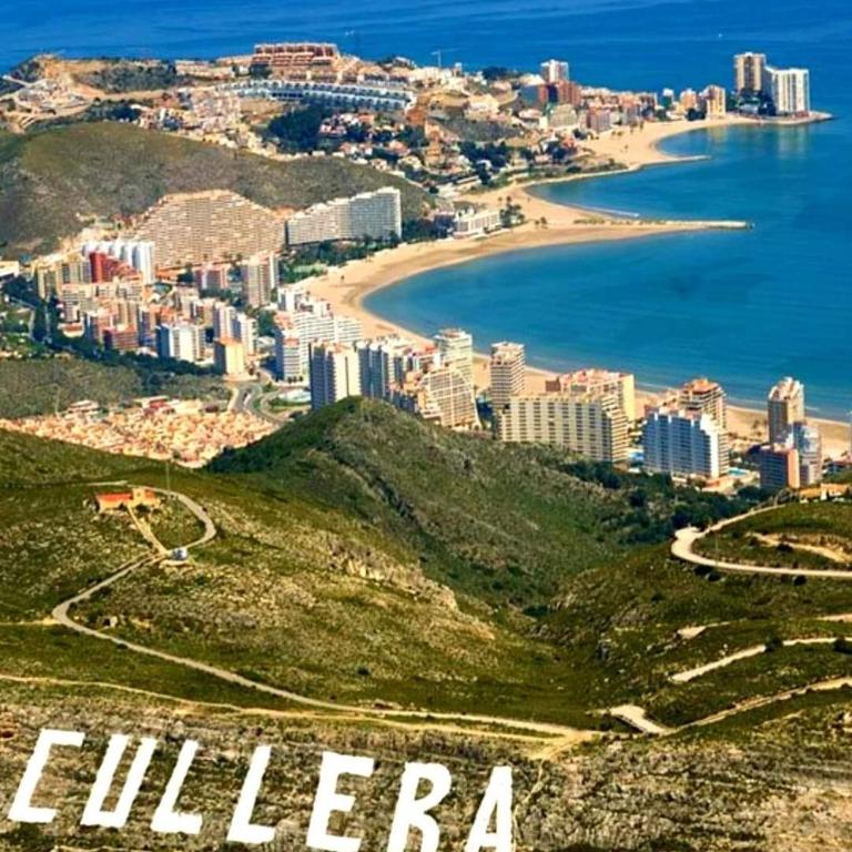 Terraza con vistas al mar Parking privado 120 mts, junto a la playa - Three-Bedroom Apartment - 3