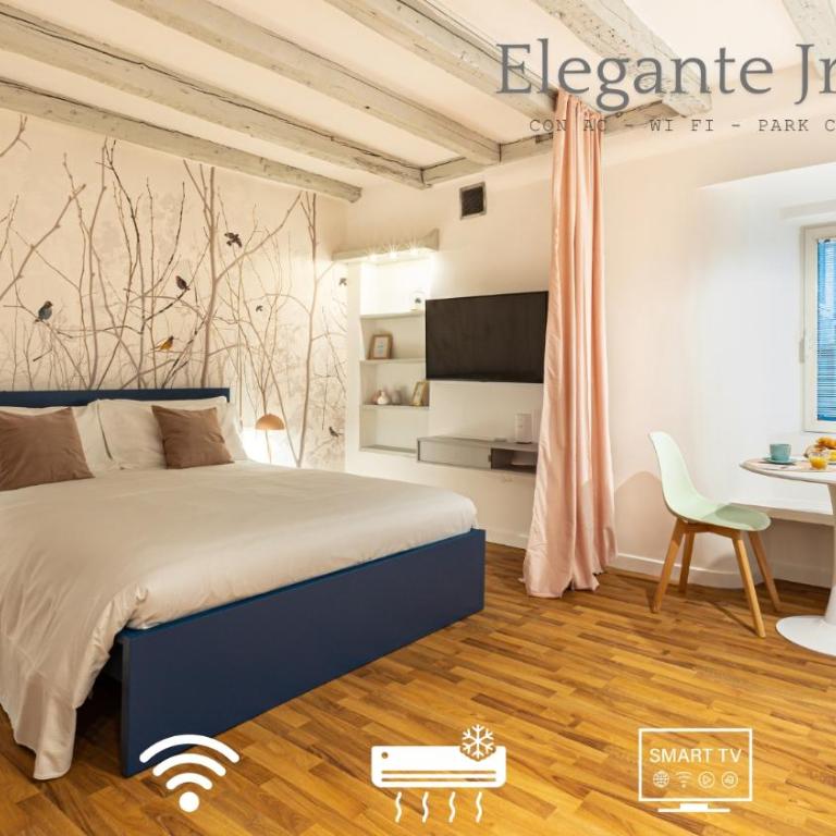 Piazza Unità d'Italia - Jr Suite con AC - Wi Fi - Park Convenzionato - Appartamento con 1 Camera da Letto - 2