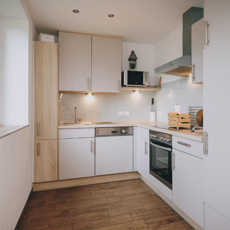 Appartements Prielau by we rent, SUMMERCARD INCLUDED - Chalet mit 2 Schlafzimmern - 5