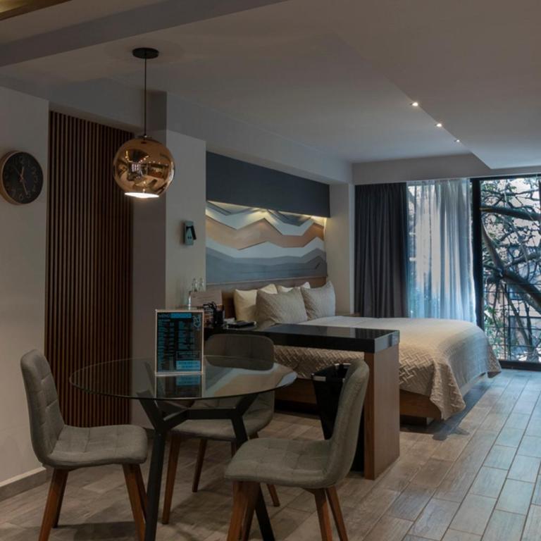 Suites MINE - Suite Superior con cama extragrande - 11