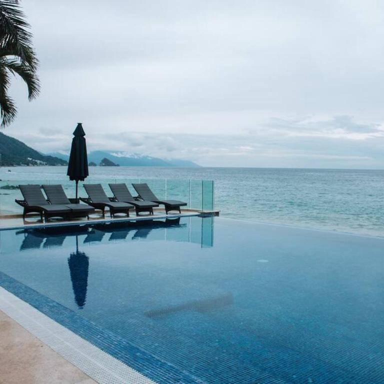 Beachfront Condo in Exclusive Zone - Three-Bedroom Apartment with Sea View - 2