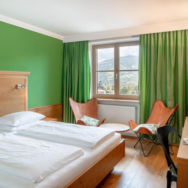Familotel Amiamo - Familienzimmer mit Gartenblick - 4