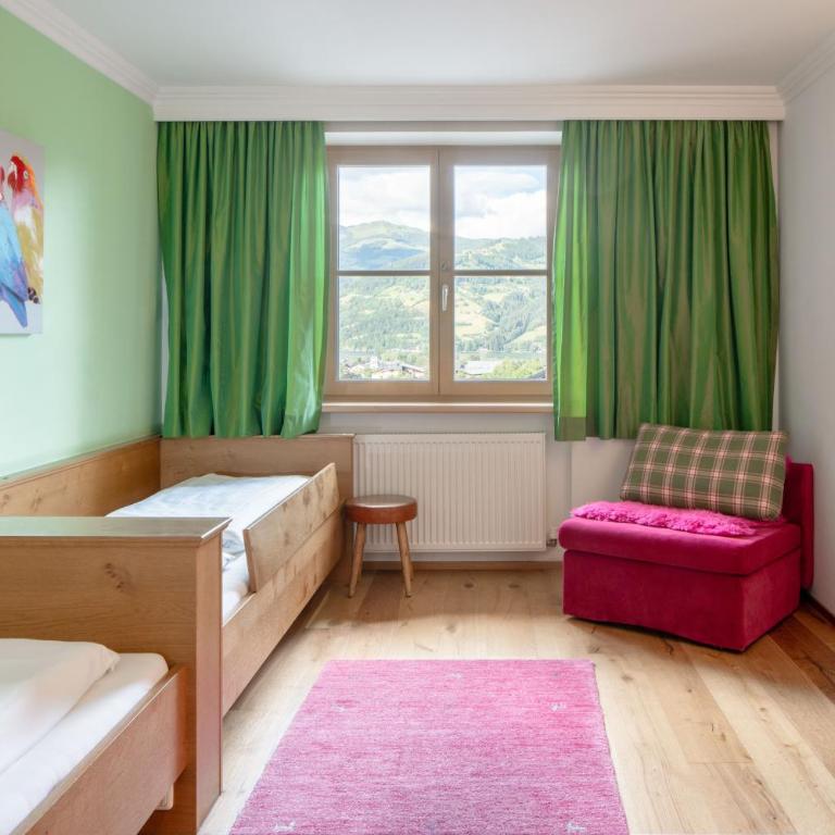 Familotel Amiamo - Familienzimmer mit Gartenblick - 3