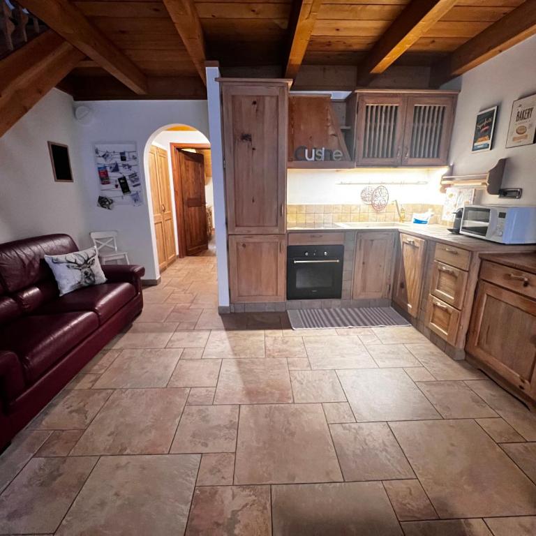 Baita Pomo - Appartamento con 2 Camere da Letto e Vista Giardino - 10
