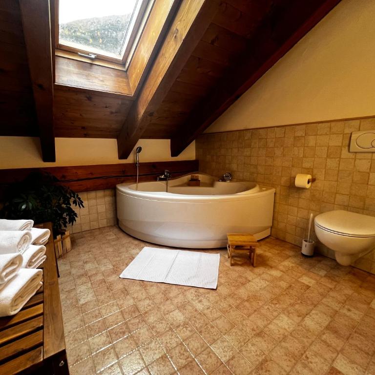 Baita Pomo - Appartamento con 2 Camere da Letto e Vista Giardino - 5