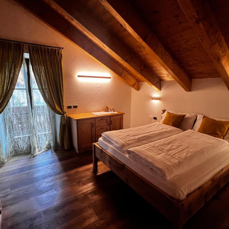 Baita Pomo - Appartamento con 2 Camere da Letto e Vista Giardino - 3