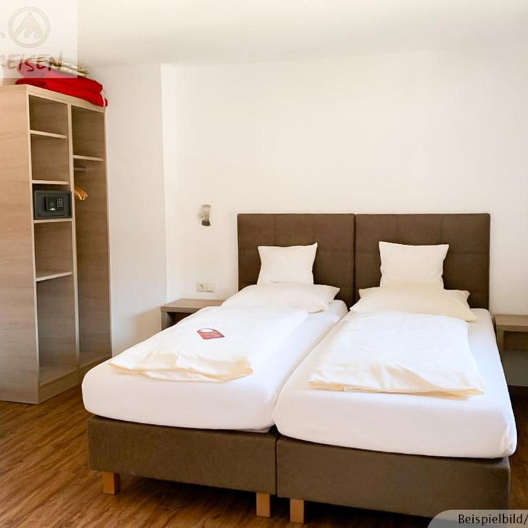 Sporthotel Bergheim - Dreibettzimmer mit Balkon - 13