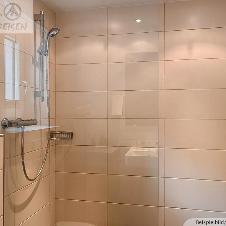 Sporthotel Bergheim - Dreibettzimmer mit Balkon - 12
