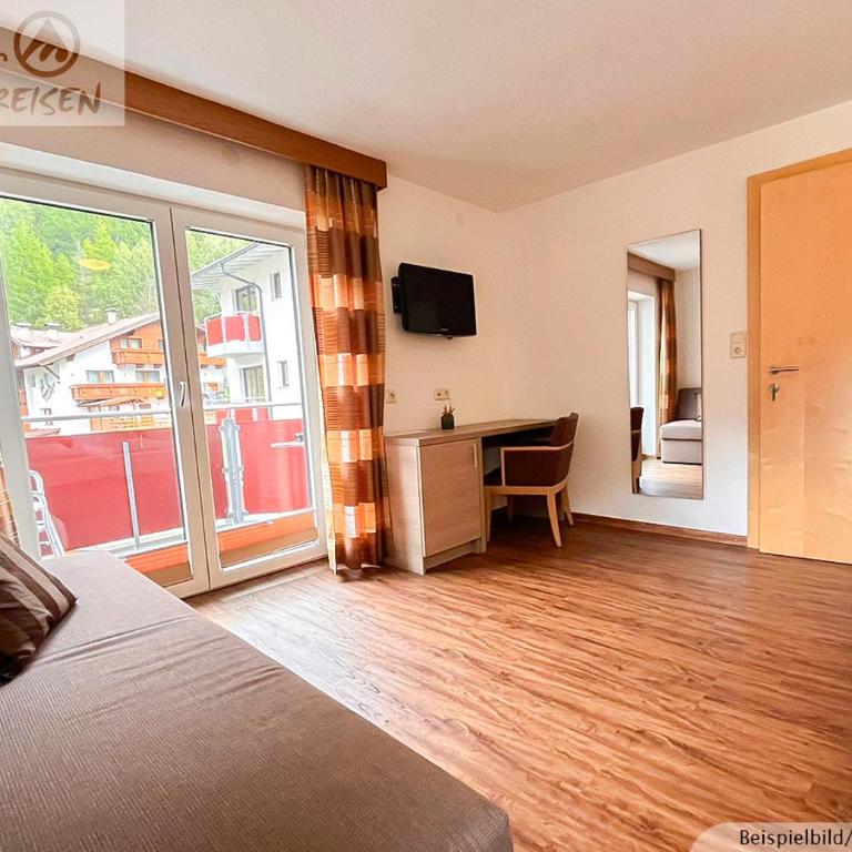 Sporthotel Bergheim - Dreibettzimmer mit Balkon - 4