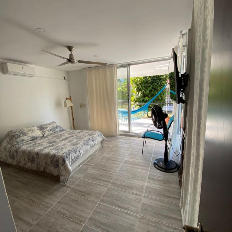Hermosa Casa de Verano con Piscina - Villavicencio - Four-Bedroom House - 11