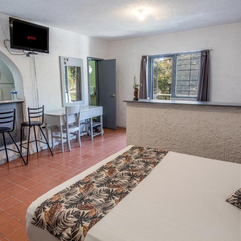Suite para 4 con Terraza Privada, en el Corazón de Chapalita 11 - One-Bedroom Apartment - 28