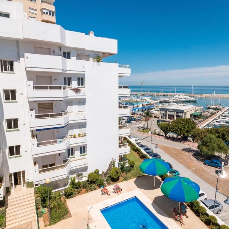 New flat with outdoor pools in Puerto de Estepona - ground floor - Apartment - Ground Floor - 1