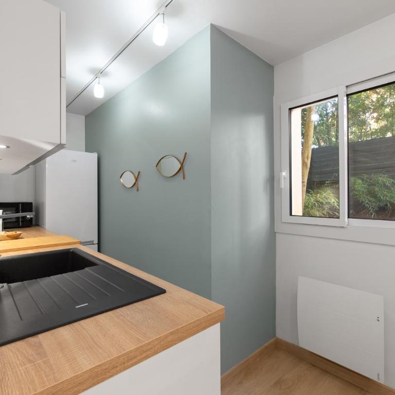 T2 Calme absolu - Coeur Toulouse - Saint Cyprien - climatisation - Terrasse arborée - One-Bedroom Apartment - 48