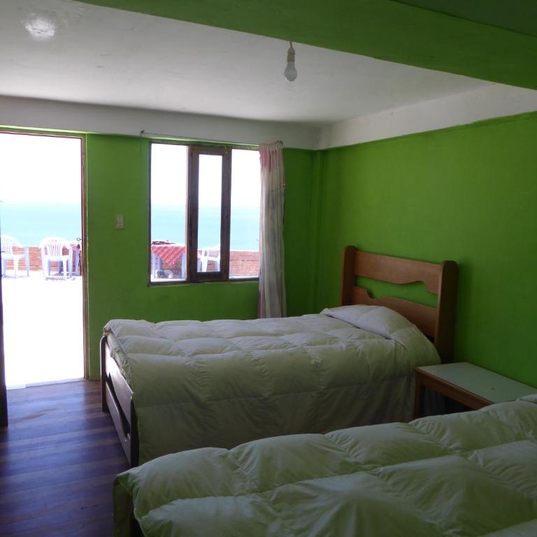 Hostal Amanecer - Habitación Doble con vistas - 2 camas - 2