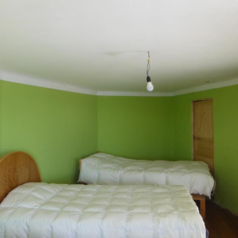 Hostal Amanecer - Habitación Cuádruple con baño compartido - 2