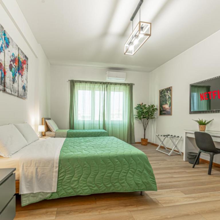 Lorena Cozy Rooms - Ospedale Gemelli - WiFi - Camera Tripla Economy con Bagno in Comune - 1