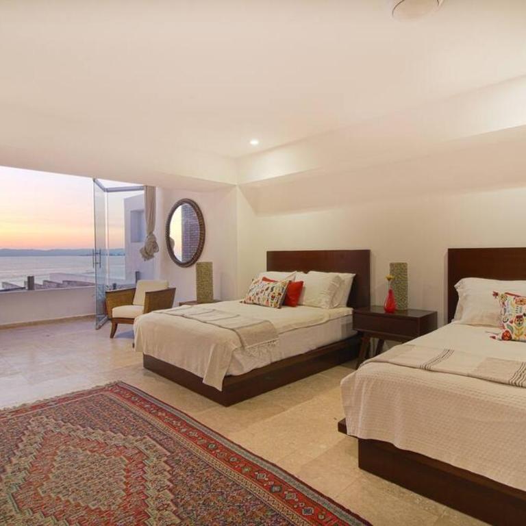Two-Story Beachfront Oasis - Three-Bedroom Apartment - 10