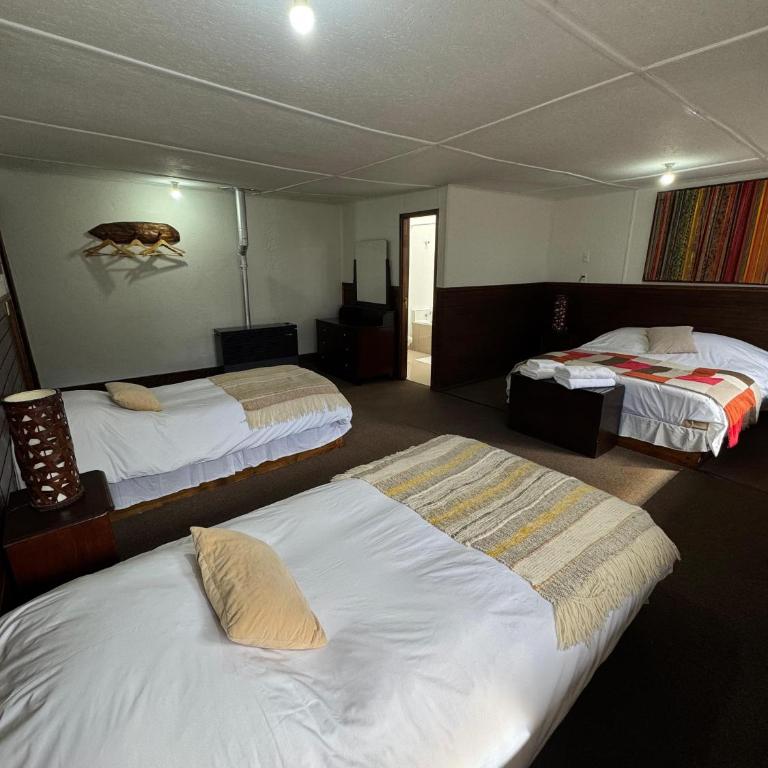Hostal Amerindia - Habitación Cuádruple con baño privado - 9