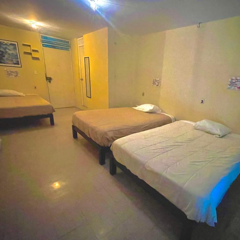 Peru Hostel Tajmani - Habitación Triple Básica con baño compartido - 1