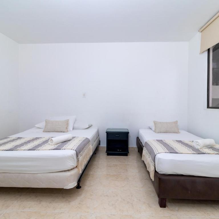 Hotel Axis Inn By GEH Suites - Standard Triple Room - 9