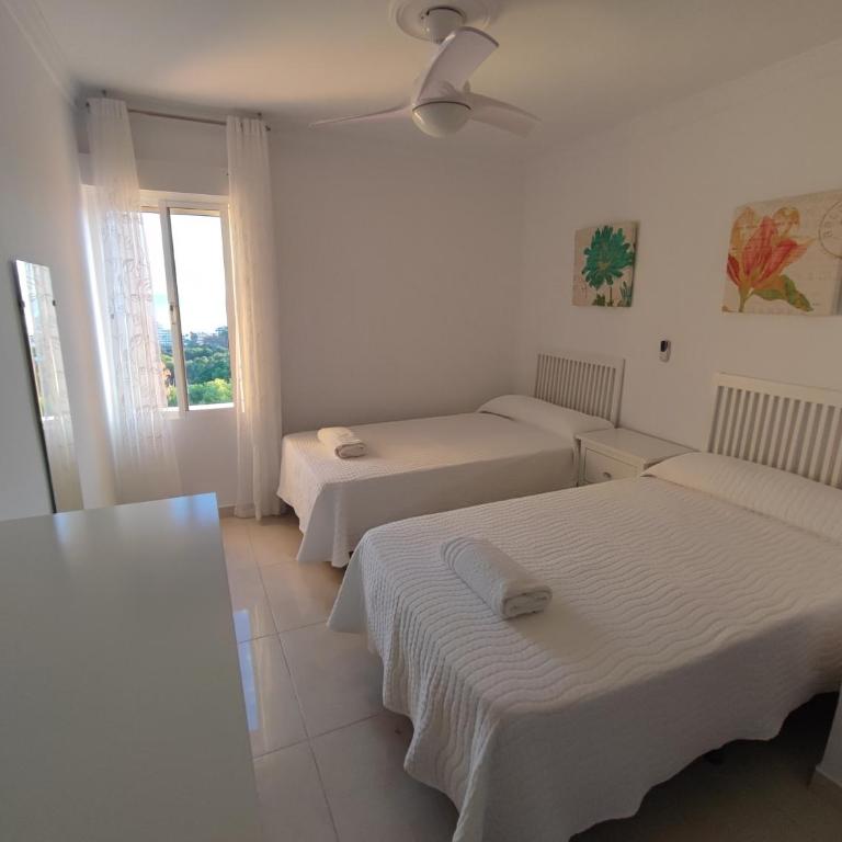 Hercules Paradise 531 - Mediterranean Sea View Terrace - Resort Pools & Gardens - 10 Min Beach - Central Benalmadena - Direct Train to Airport & Malaga - Fast Private WiFi - Remote Work and FireTV ready - One-Bedroom Apartment - 4