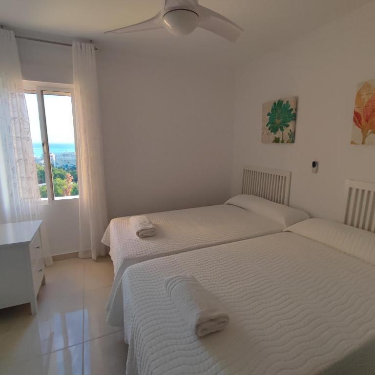 Hercules Paradise 531 - Mediterranean Sea View Terrace - Resort Pools & Gardens - 10 Min Beach - Central Benalmadena - Direct Train to Airport & Malaga - Fast Private WiFi - Remote Work and FireTV ready - One-Bedroom Apartment - 18