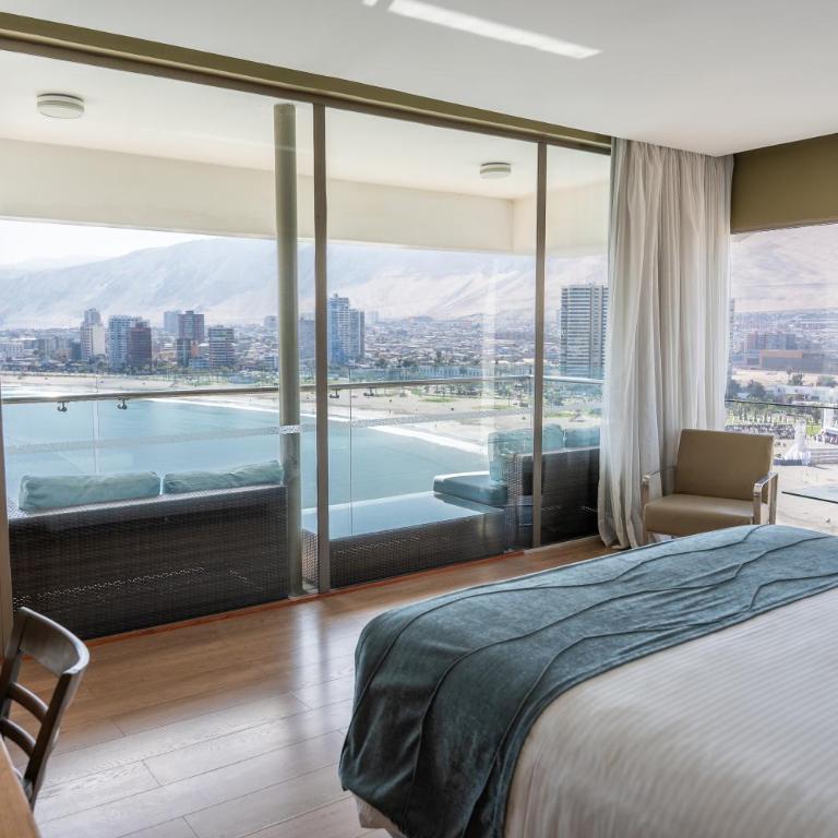Terrado Suites Iquique - Habitación con cama grande y vistas al mar - 10