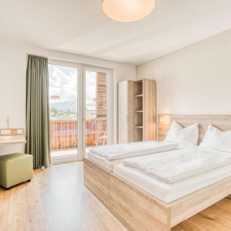 COOEE alpin Hotel Kitzbüheler Alpen - Doppel-/Zweibettzimmer mit Aussicht - 1