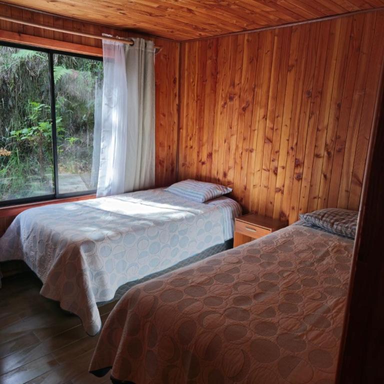 Cabaña 8 a 9 personas ideal 2 matrimonios y niños - Four-Bedroom Vacation Home - 23