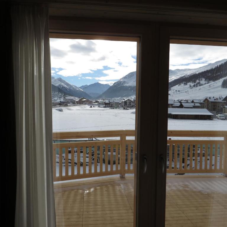 B&B Ecohotel Chalet des Alpes - Camera Matrimoniale/Doppia con Letti Singoli con Letto Supplementare - 13