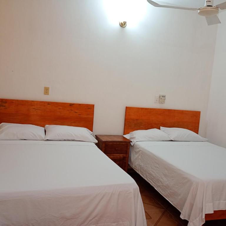 Hospedaje casa Yuca - Habitación Doble Estándar con 2 camas dobles - 12