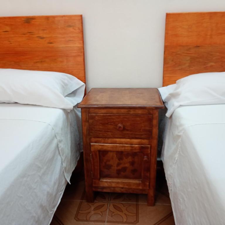 Hospedaje casa Yuca - Habitación Doble Estándar con 2 camas dobles - 10