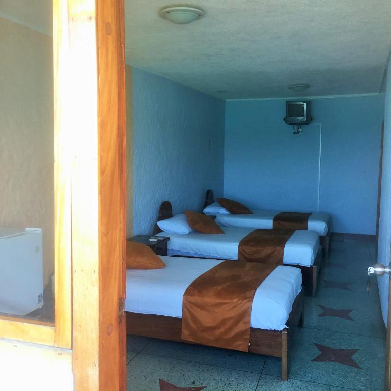 Hostal Estrella de Mar - Habitación Triple Estándar con vistas al mar - 1