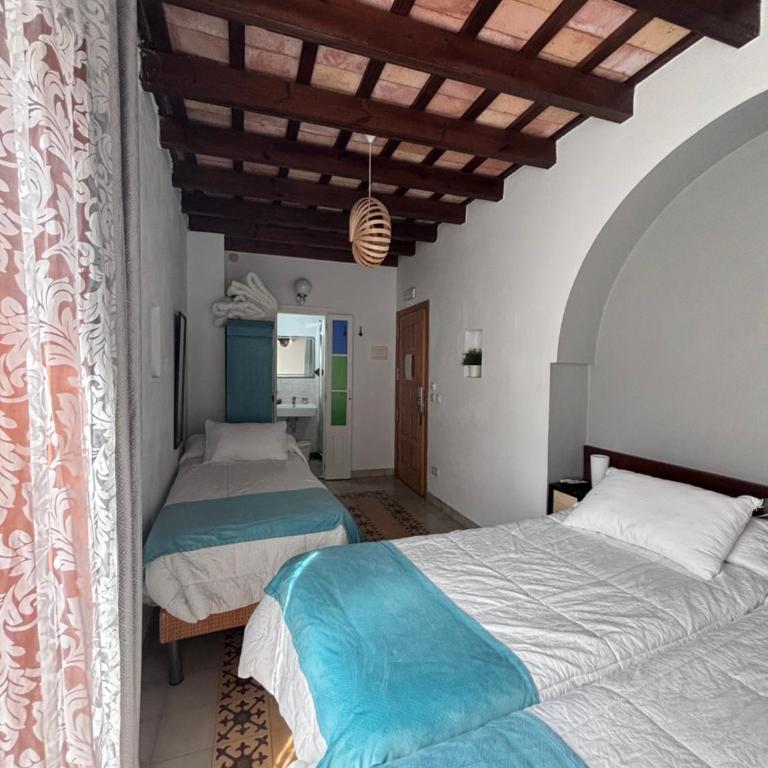 Vagamundos - Habitación Doble con cama supletoria - 1 o 2 camas - 16