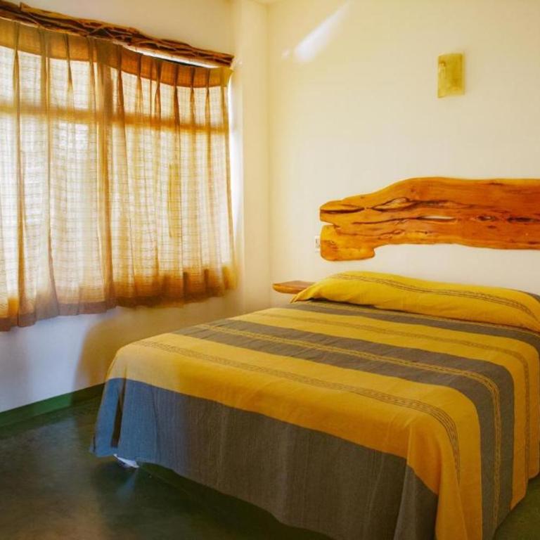 Madre Tierra Hostal - Habitación Doble con baño compartido - 1