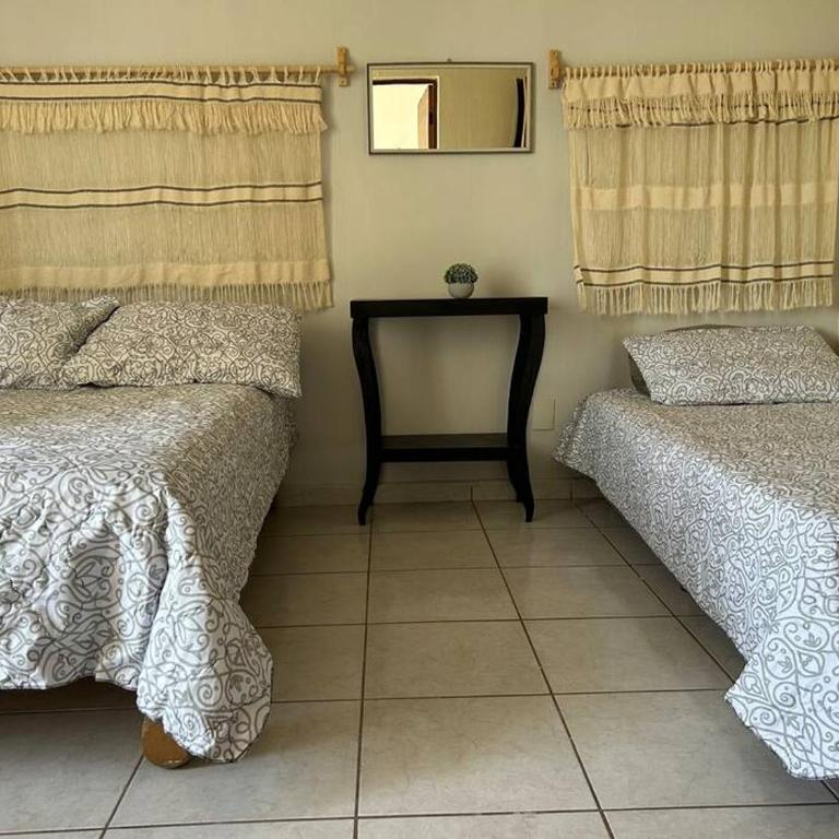 La casa de Anita - Three-Bedroom House - 17