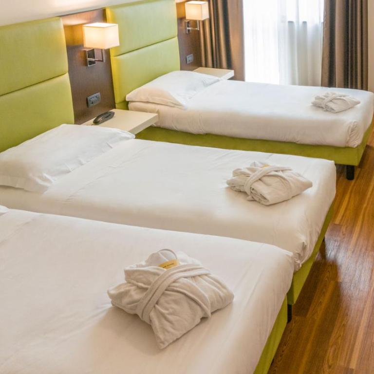 Kona Hotel Verona - Camera Tripla Deluxe - 7