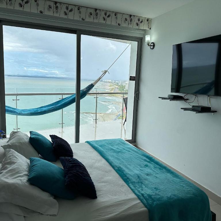 Amplios Aptos de Lujo Frente a la Playa a 5 Minutos del Centro y del Aeropuerto, en Edificio con Piscina, Jacuzzi, Sauna, Gimnasio, Turco y Seguridad las 24 hs. - Apartamento con vistas y balcón - 21