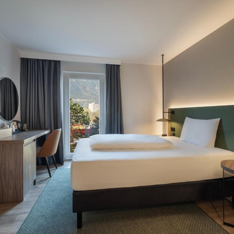 Hilton Garden Inn Innsbruck Tivoli - Zimmer mit Kingsize-Bett - 8