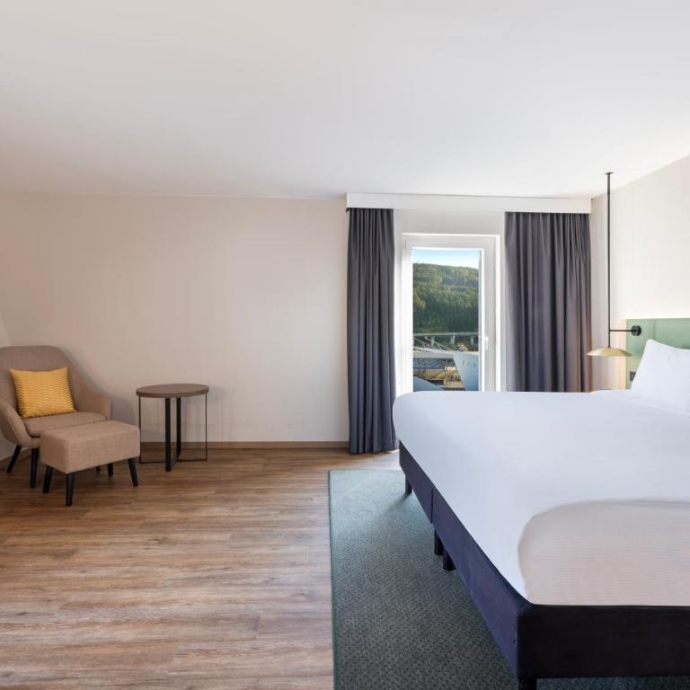 Hilton Garden Inn Innsbruck Tivoli - Deluxe Eckzimmer mit Kingsize-Bett - 5