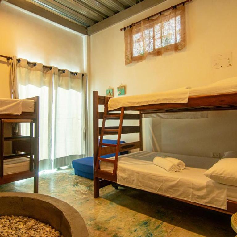 Casa playa Alquiler vacacional - Habitación Cuádruple con vistas al mar - 2
