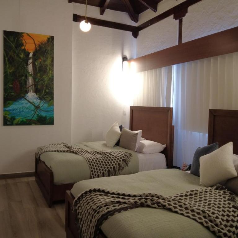 Hotel Boutique Mitad Del Mundo - Suite Doble Deluxe - Cama grande - 5