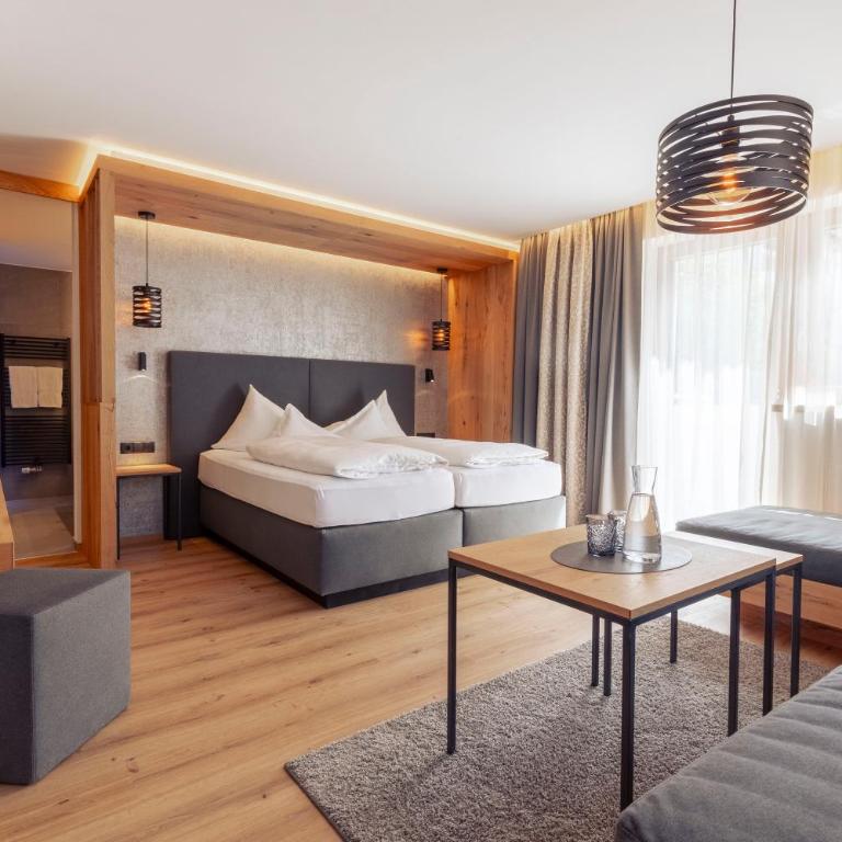Hotel Mondin - Deluxe Doppelzimmer mit Zustellbett - 2